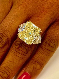 Fancy Intense Yellow Diamond 14.24 CT, GIA-FIY-VS1, Platinum/ YG Diamond Ring