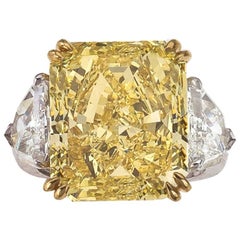 Fancy Intense Yellow Diamond 14.24 CT, GIA-FIY-VS1, Platinum/ YG Diamond Ring