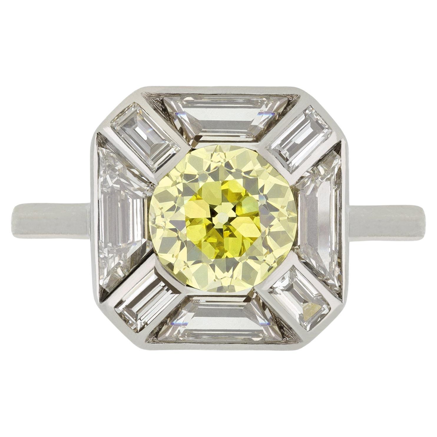 Fancy intense yellow diamond cluster ring, circa 1925. For Sale