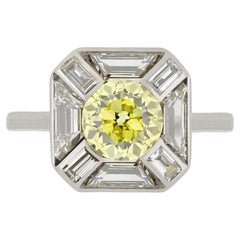 Fancy intense yellow diamond cluster ring, circa 1925.