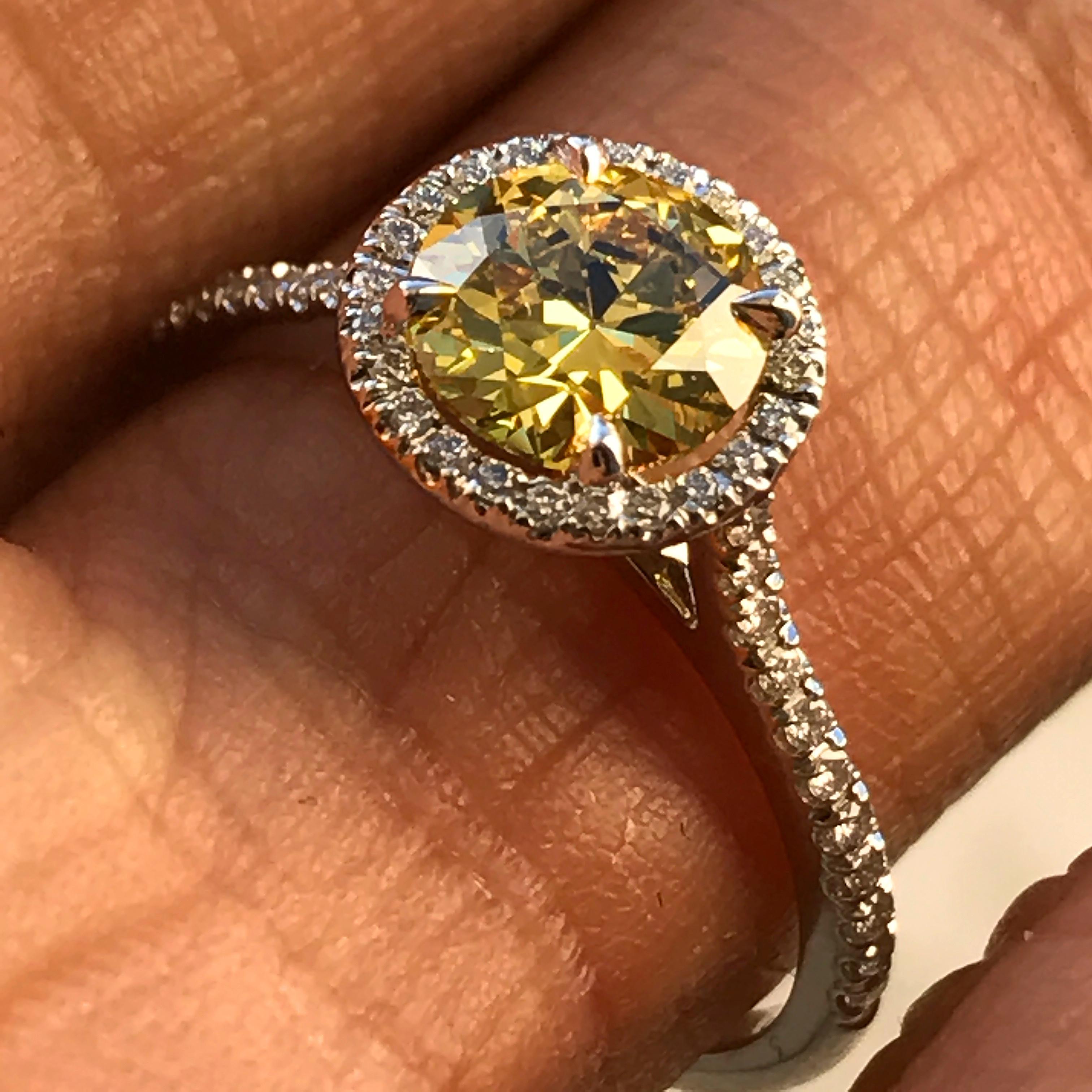 1.3 Carat TW Fancy Intense Yellow GIA Diamond Halo Engagement Ring.

Such an amazing yellow and saturation.

Ring May be made to order from scratch to accommodate your exact finger size 
or a different stone if the budget requires it, takes