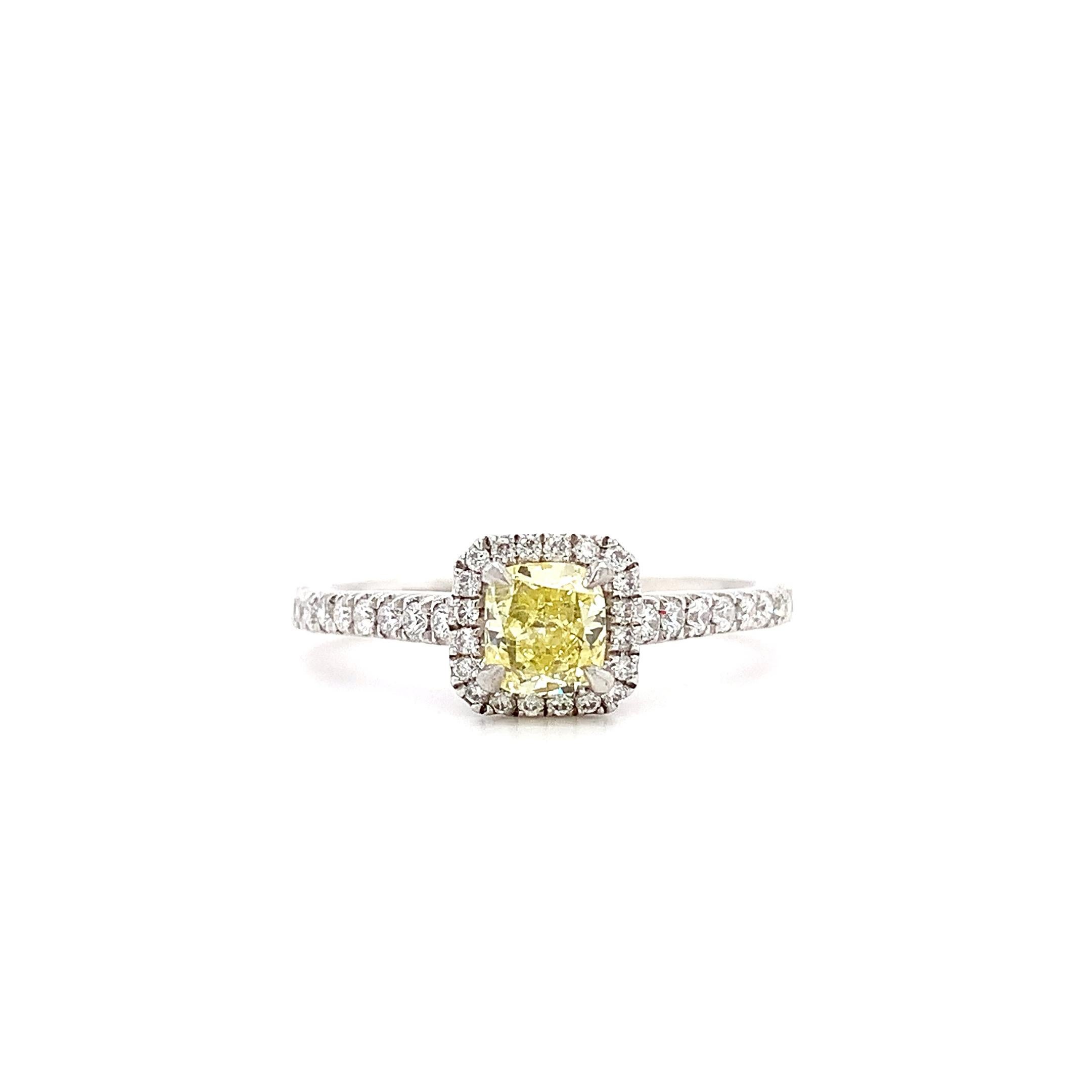 Cushion Cut Fancy intense yellow diamond halo engagement ring platinum For Sale