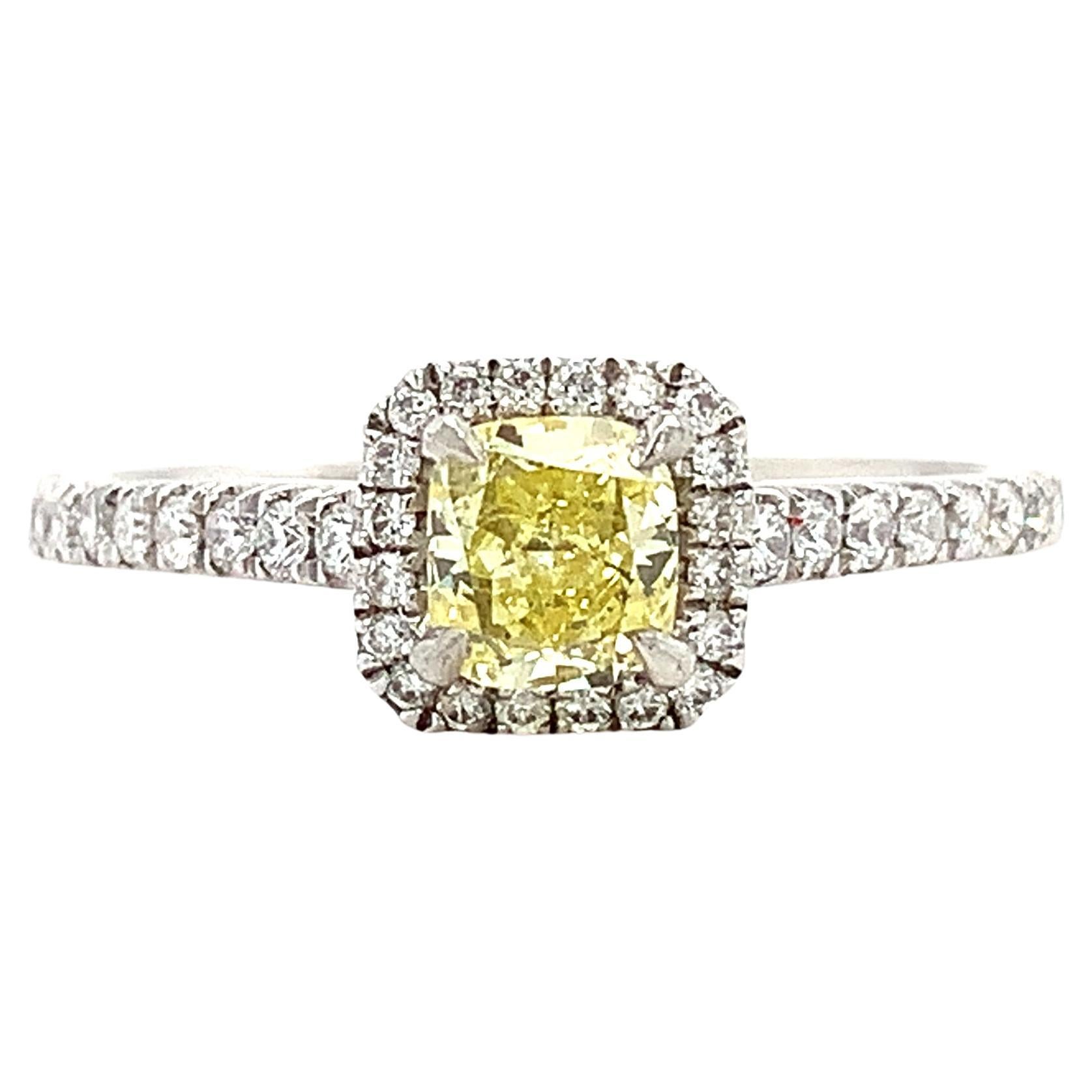 Fancy intense yellow diamond halo engagement ring platinum