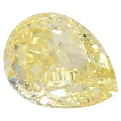 FANCY INTENSE YELLOW GIA Certified 4 Carat Pear Cut Diamond