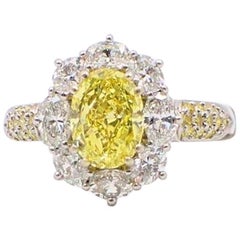 Fancy Intense Yellow Oval 3.69 TCW Diamond Engagement Ring Halo 
Diamond Band