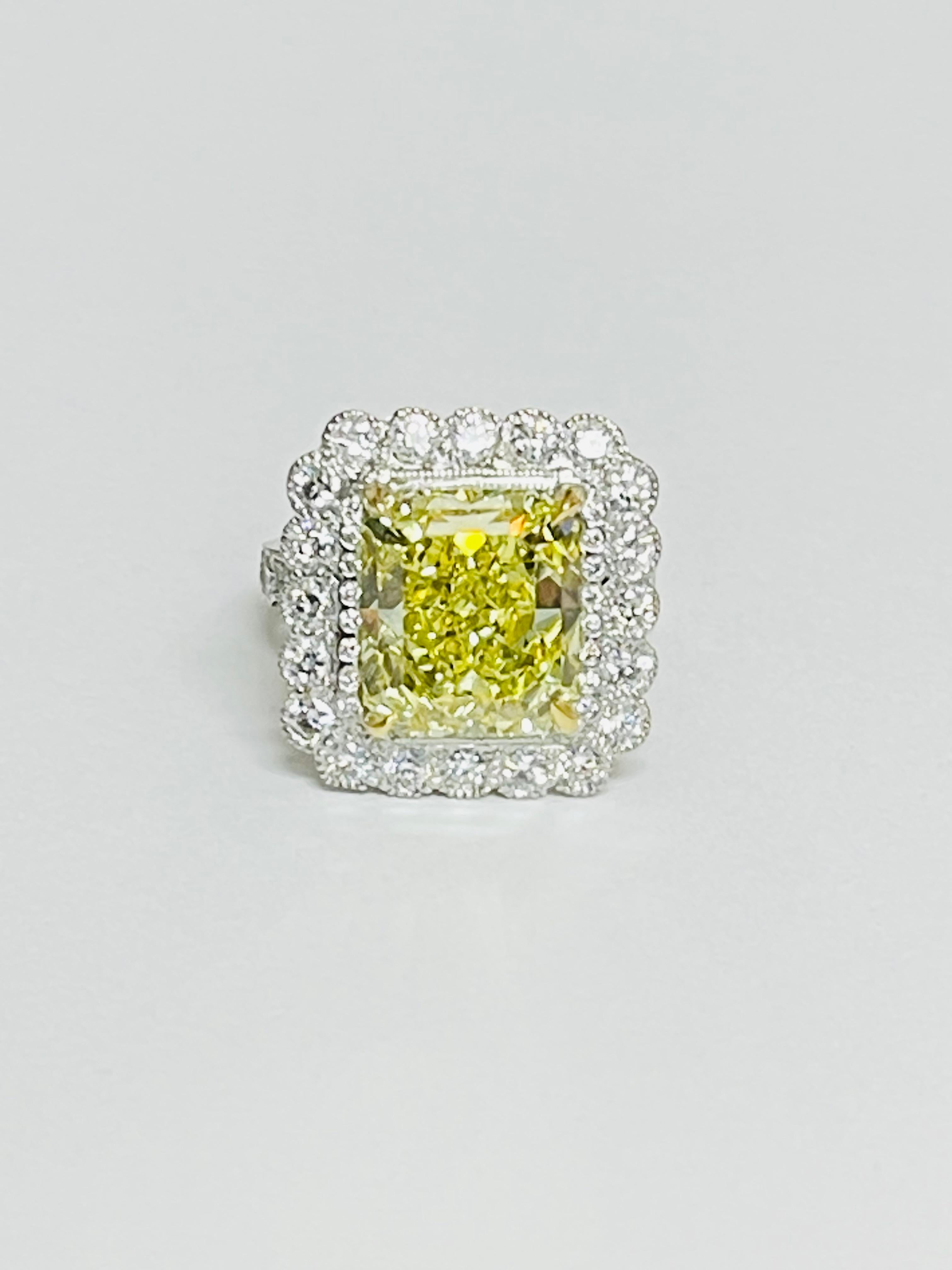 Women's Fancy Intense Yellow Radiant Diamond And White Diamond Engagement Ring, GIA For Sale