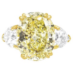 GIA Certified 4.59 Carat Fancy Yellow Oval Diamond Ring