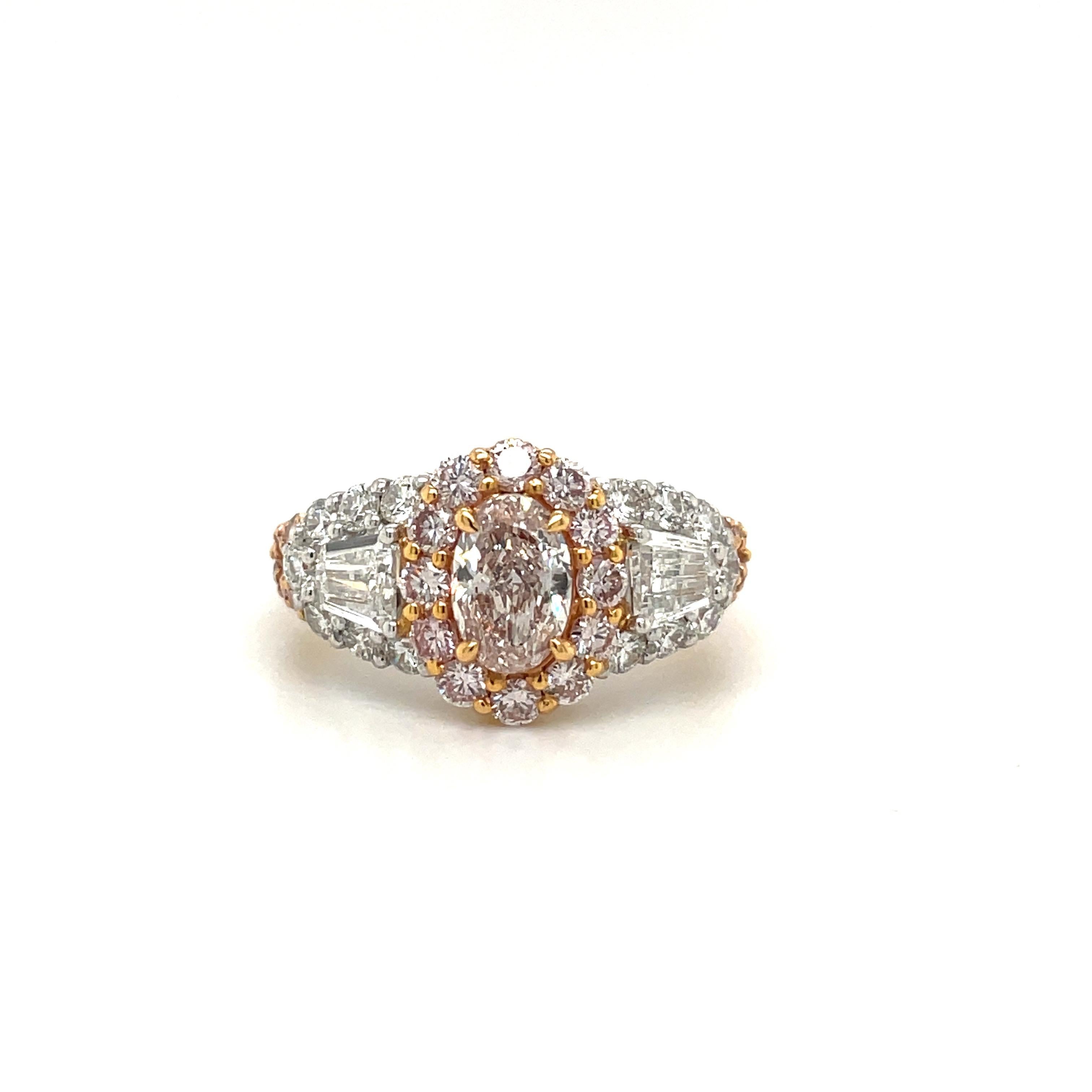 Oval Cut Fancy Light Pink Diamond Ring with White Diamonds Set in Rose Gold and Platinum For Sale