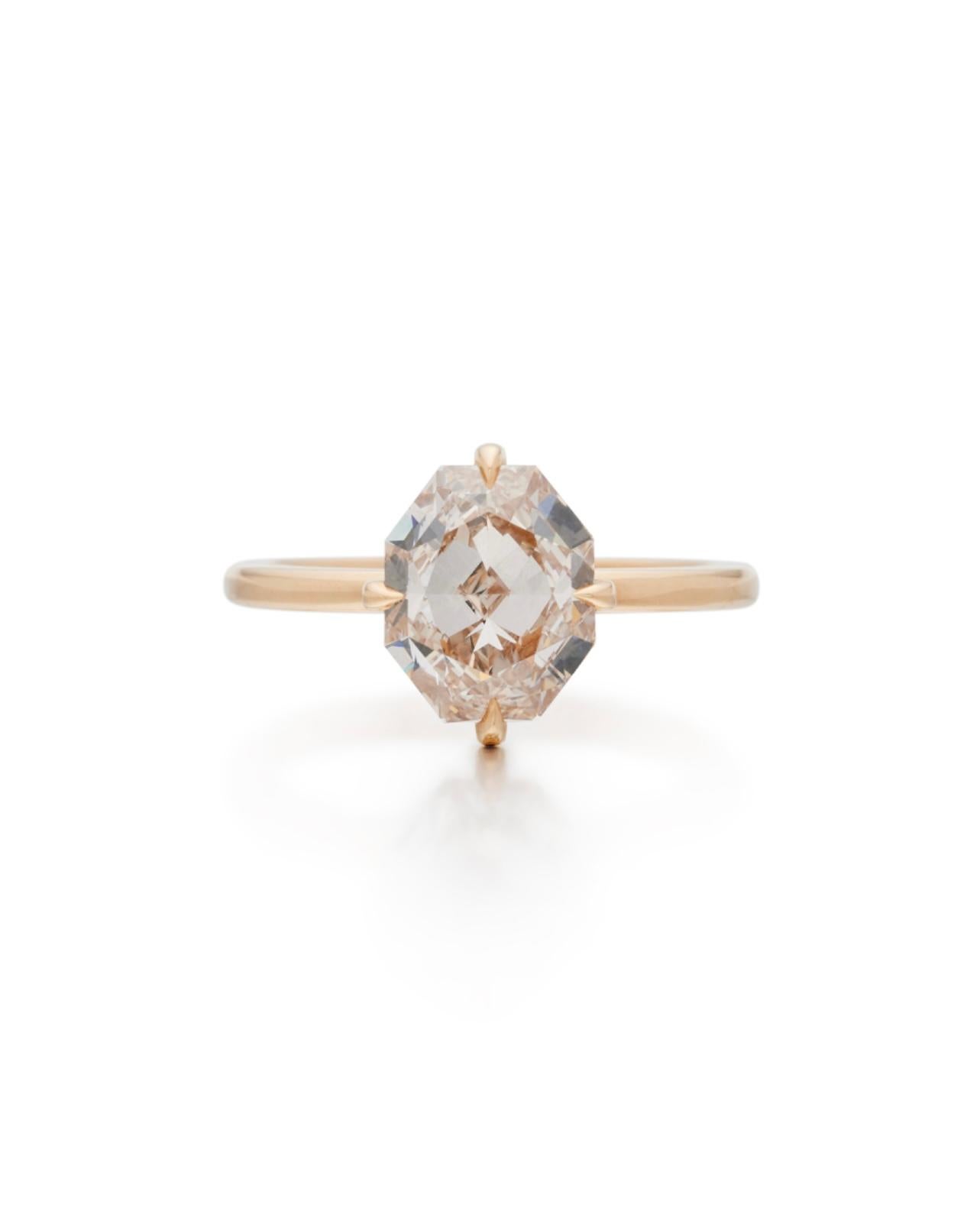 A gorgeous and unusual 2.37 carat Fancy light pinkish brown octagonal shaped diamond engagement ring. 

The details are as follows : 
Fancy light pinkish brown octagonal diamond weight : 2.37 carat 
Clarity : VVSI1 
Metal : 18 karat rose gold
Total