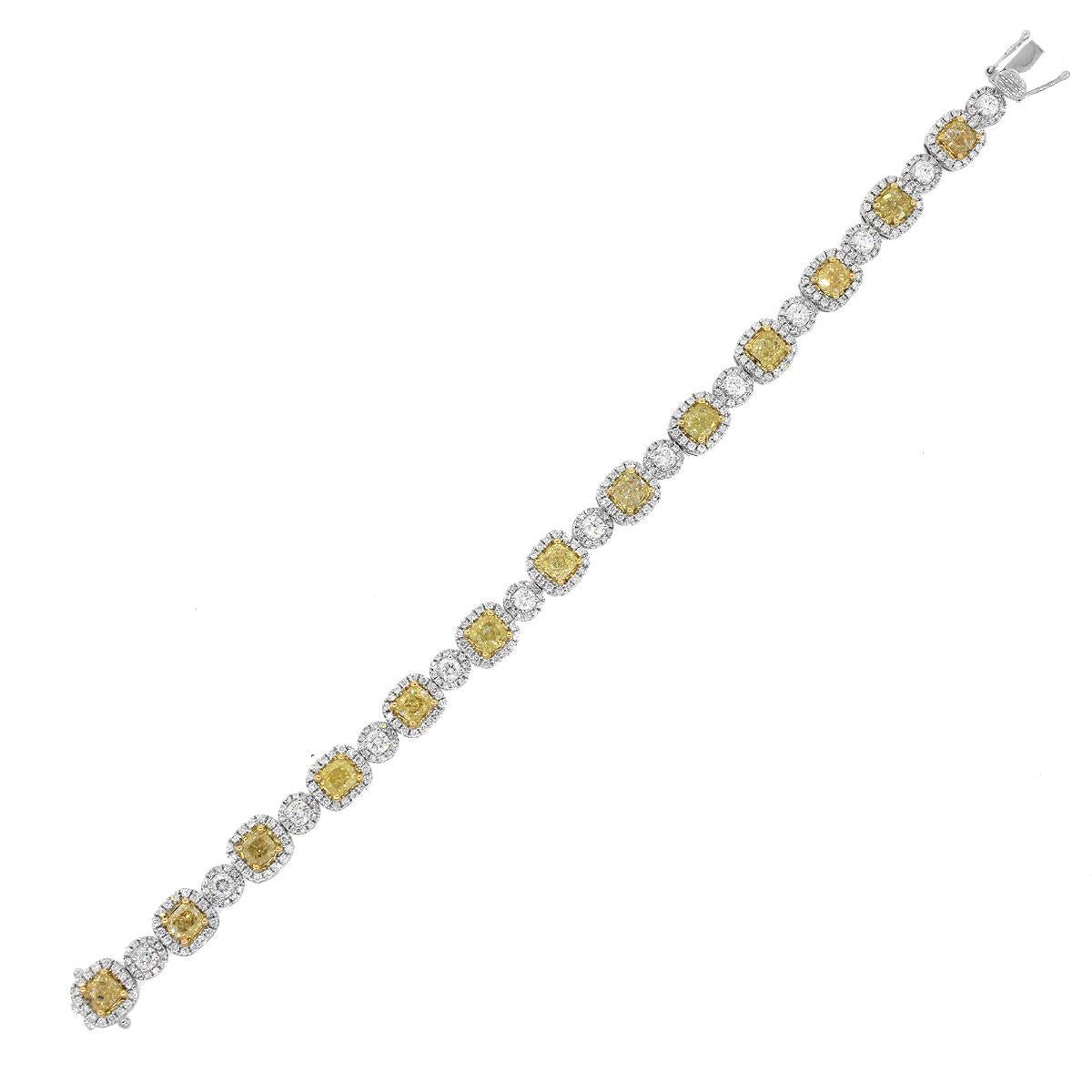 Material: 18k White Gold
Yellow Diamond Details: Approximately 6.52ctw of cushion cut diamonds. Diamonds are Fancy light yellow in color and VS in clarity.
Diamond Details: Approximately 3.38ctw of round brilliant diamonds. Diamonds are G in color