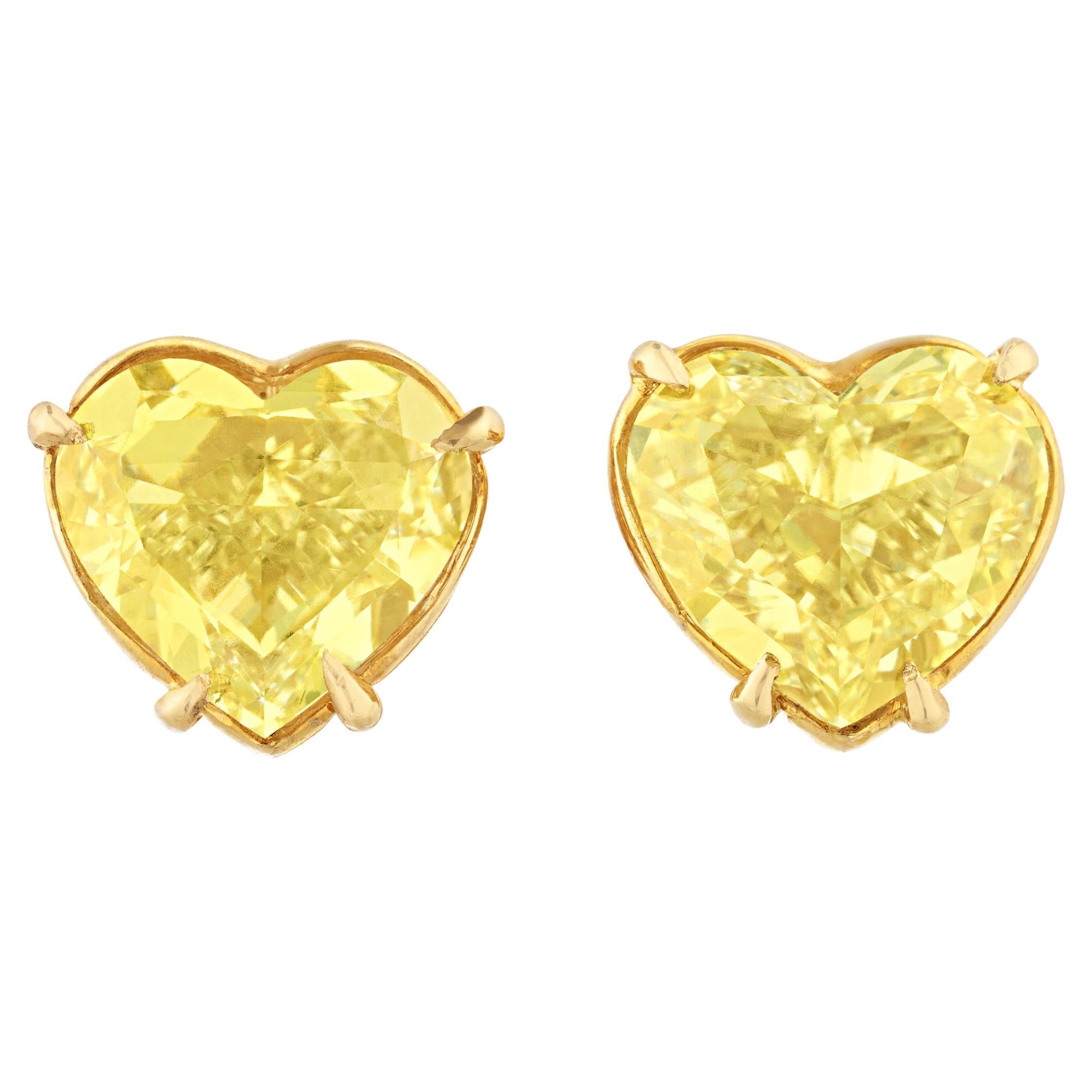 Fancy Light Yellow Diamond Heart Earrings, 4.21 Carats For Sale