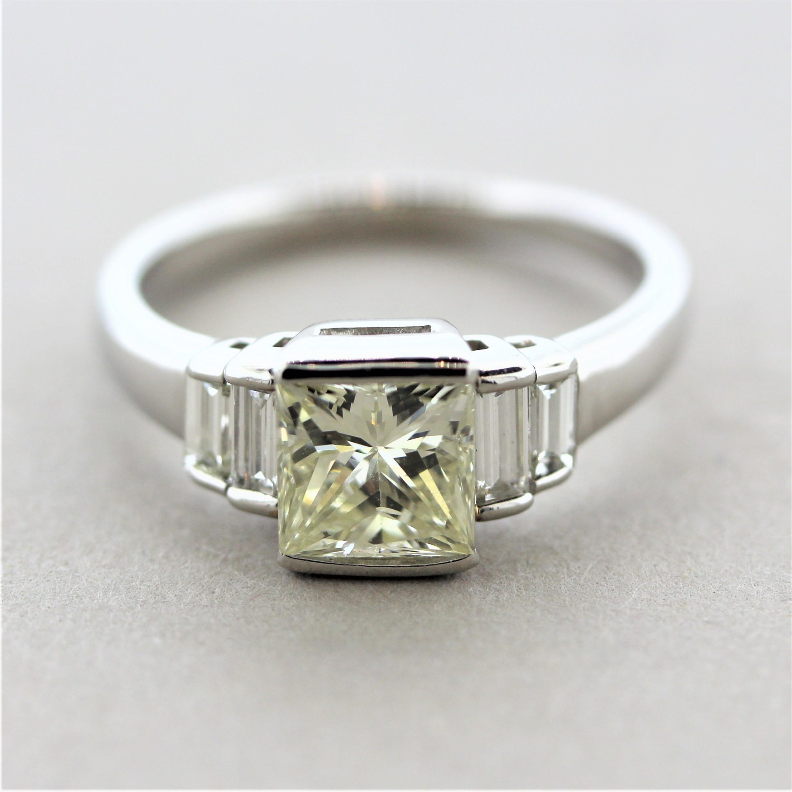 A simple yet classic engagement style ring featuring a 1.46 carat princess-cut diamond with a fancy light yellow color. It is complemented by 4 white baguette-cut diamonds set on its sides. Hand-fabricated in platinum, and ready for any