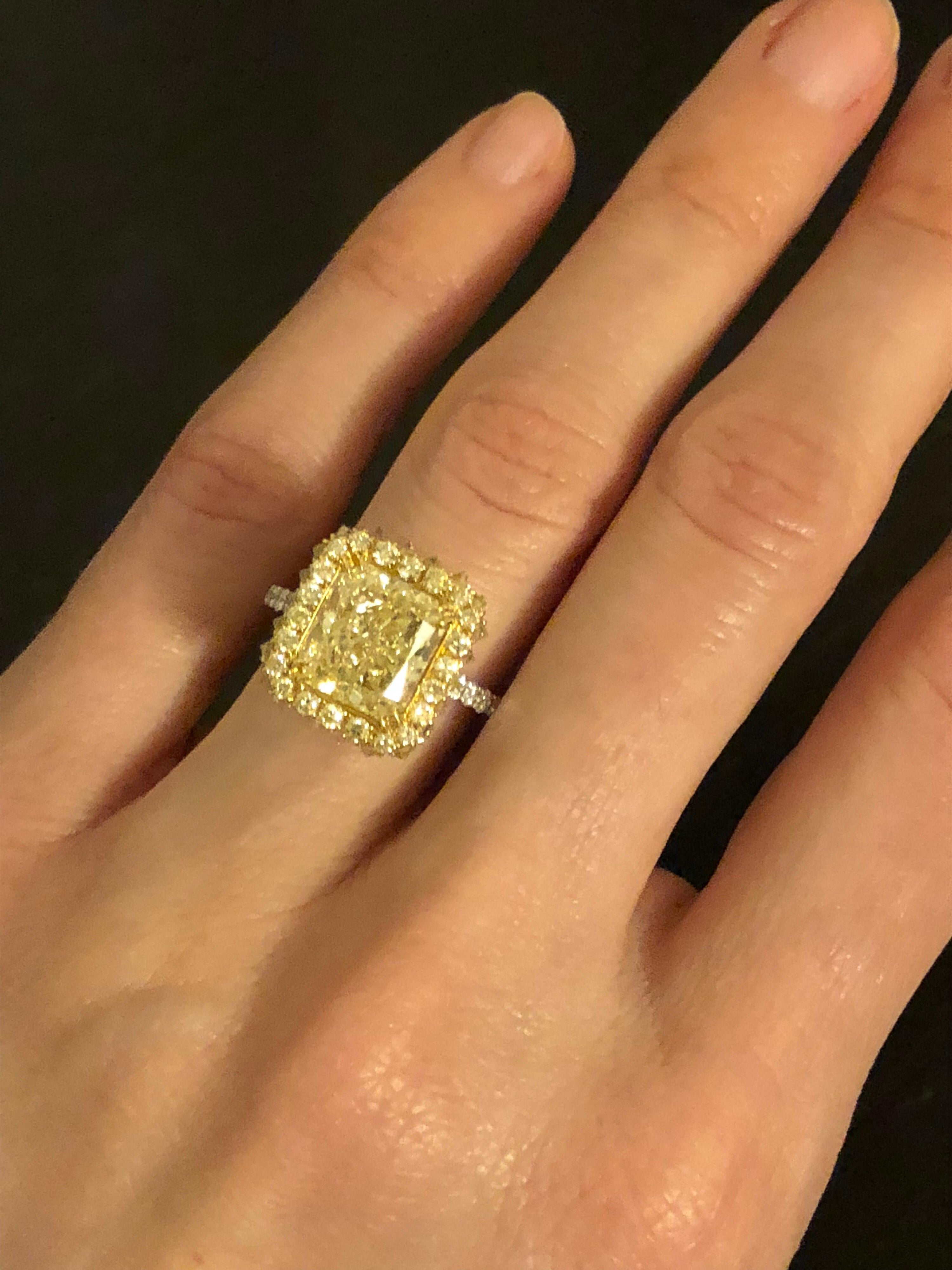 Women's Fancy Light Yellow Diamond Ring 3.78 Carat Radiant Cut GIA Certified For Sale