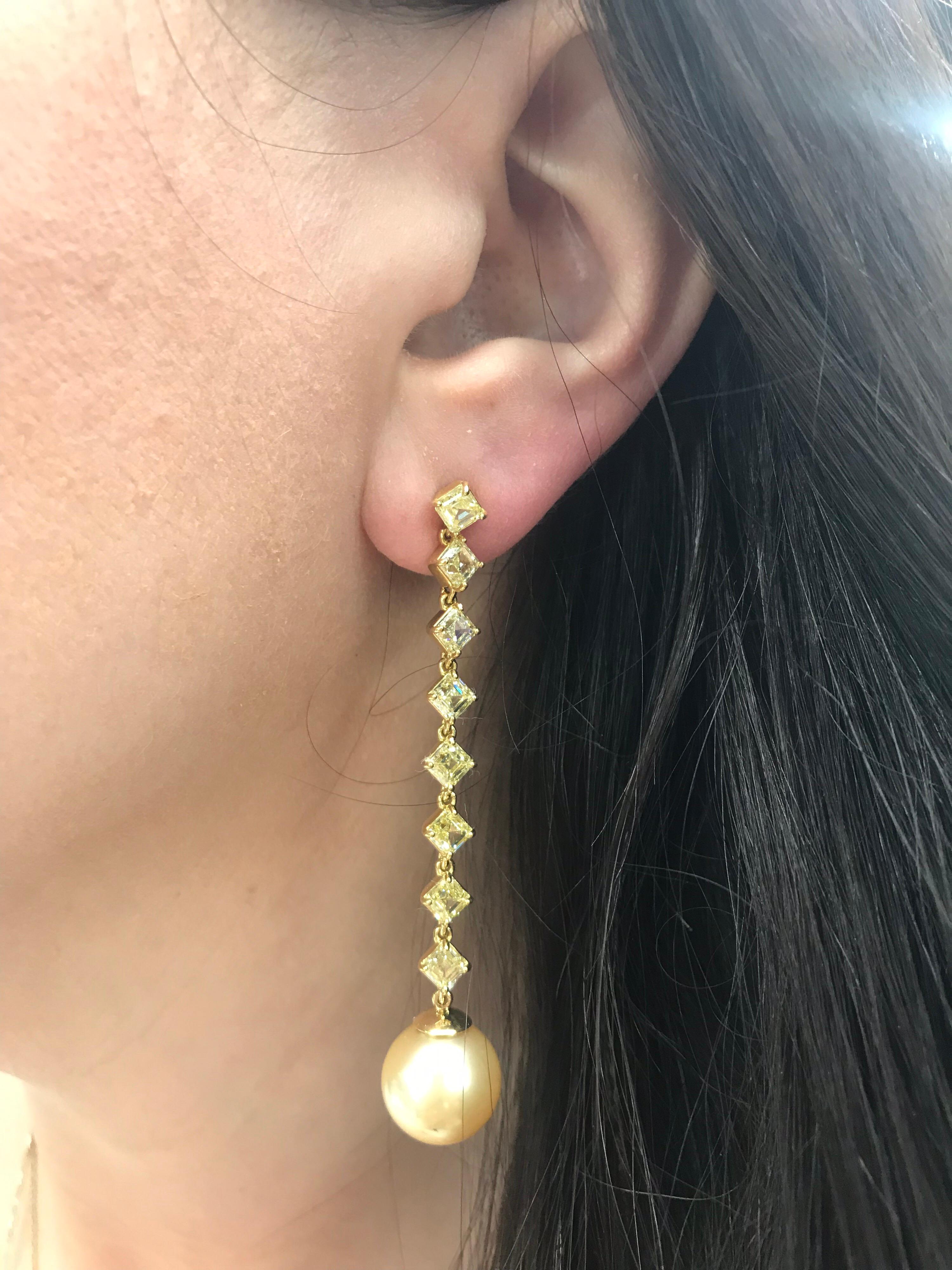 Diamond drop earrrings featuring 16 Fancy Light Yellow Asscher cuts weighing 6.14 carats of VVS2-VS1 clarity and two golden South Sea pearls meausring 12-13 mm. 

Very impressive in person! Shows more of a golden tone. 
