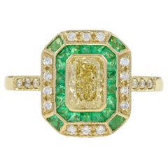 GIA Fancy Light Yellow Diamond with Emerald and Diamond Halo Art Deco Style Ring