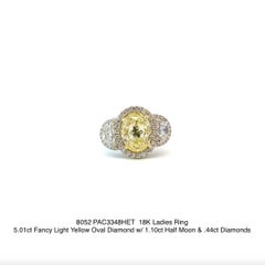 Fancy Light Yellow Oval Diamond Ring