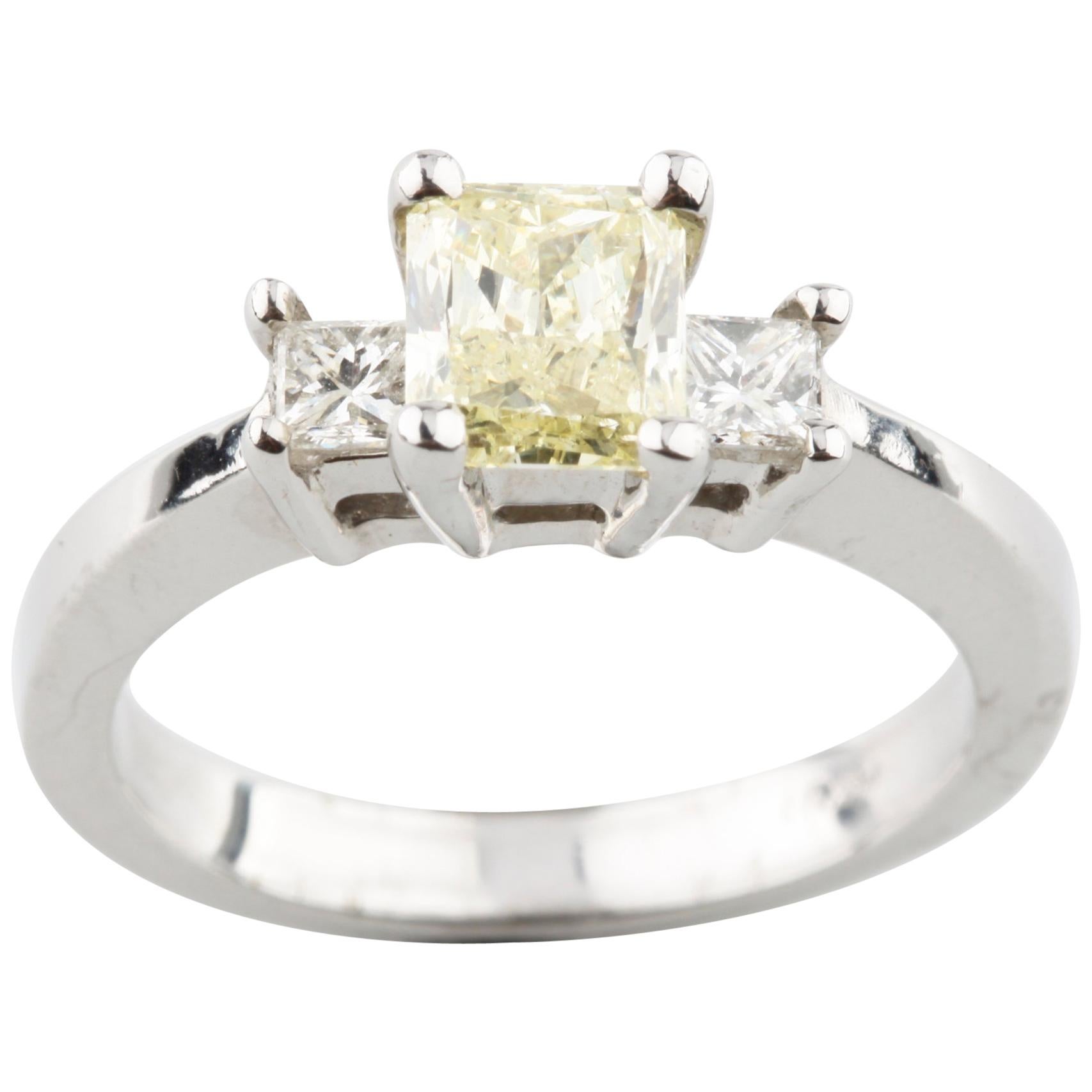 Fancy Light Yellow Radiant Cut 14 Karat White Gold 1.01 Carat Engagement Ring For Sale