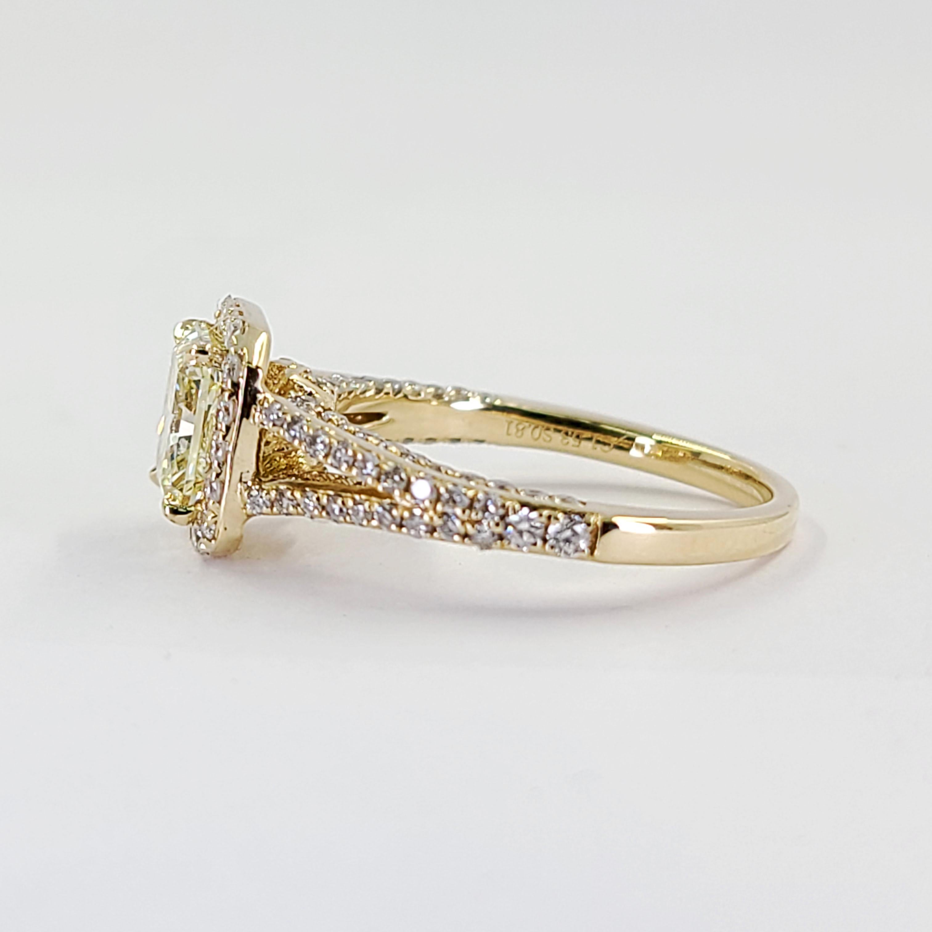 14 Karat Yellow Gold Ring Featuring A 1.53 Carat Radiant Cut Diamond EGL Graded (Report #68357802D) As Fancy Light Yellow Color & SI1 Clarity Accented By 108 Round Brilliant Cut Diamonds Of VS Clarity & H Color Totaling An Additional 0.81 Carats.
