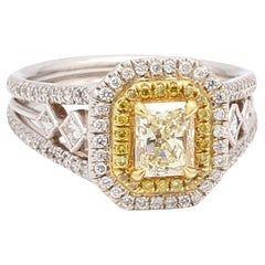Fancy Light Yellow Radiant & Round Diamond Ring