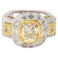Fancy Light Yellow Three Stone Diamond Ring 5.69ctw