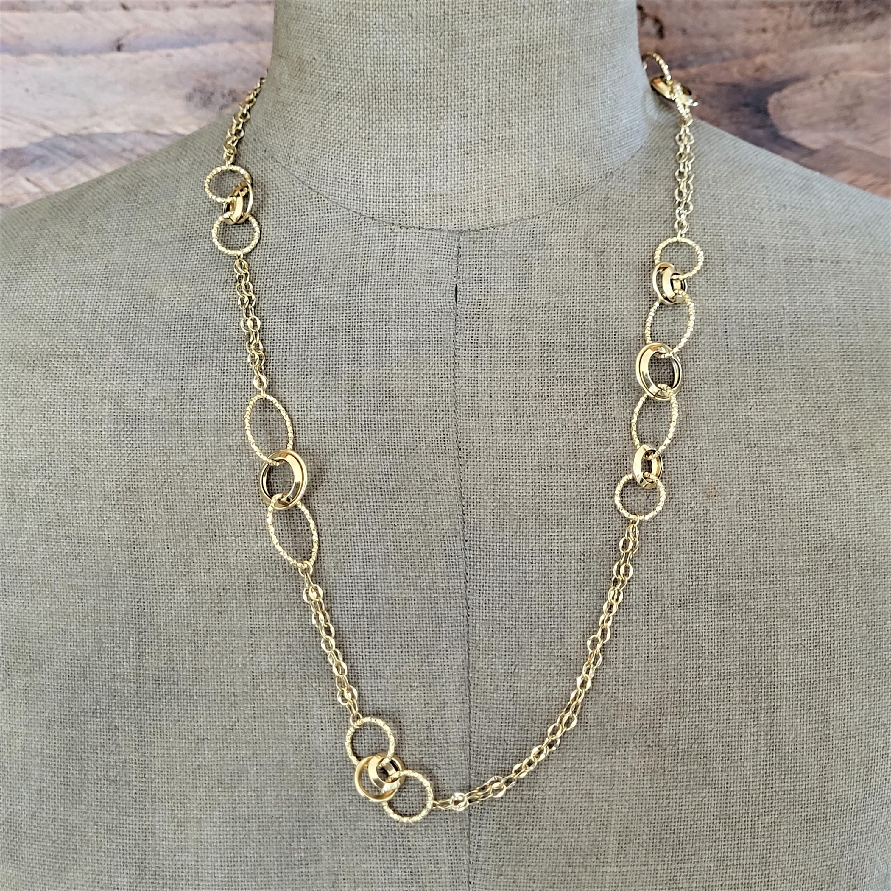 All that shimmers is gold! A divine 24 inch fancy gold necklace crafted in 18ct gold. Light and jingly! We absolutely love it!  It catches the eye at all the right times.  Is comfortable to wear and hugely versatile.  J'adore!