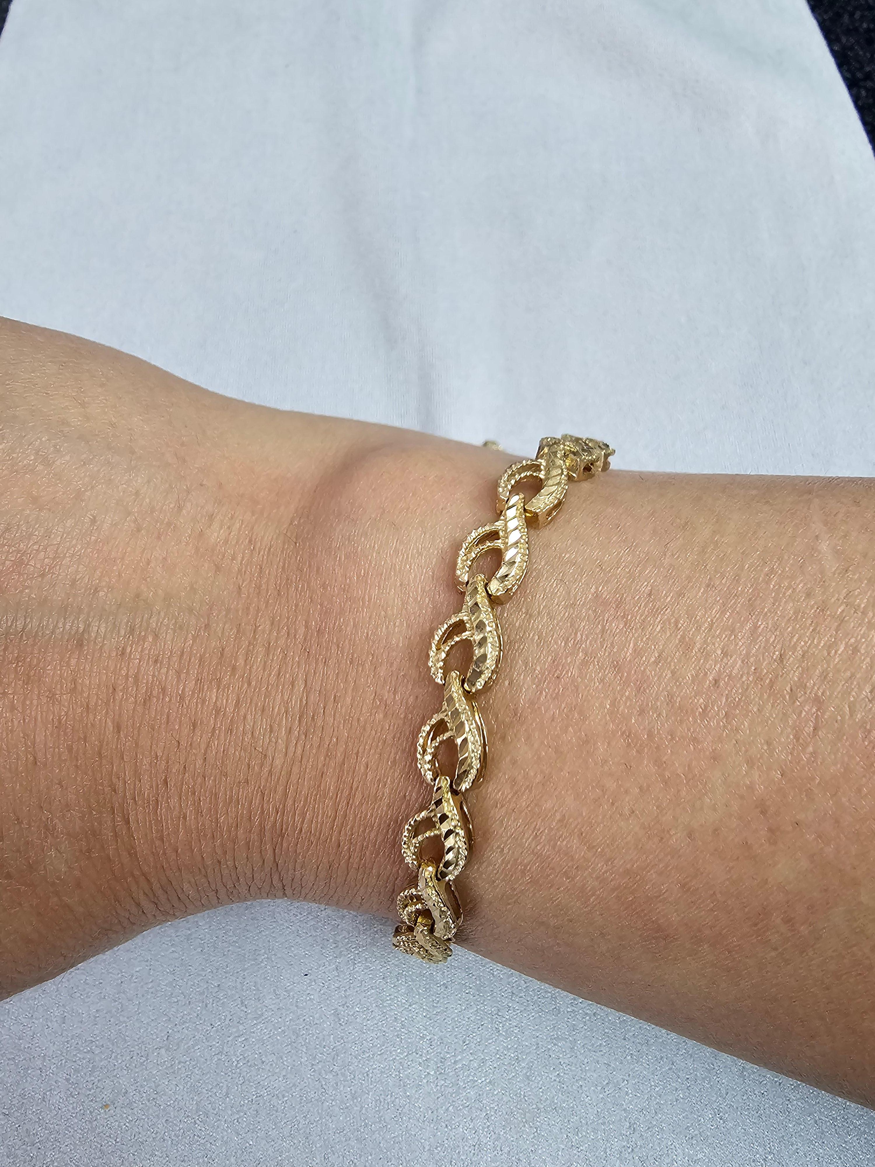 ♥ Product Summary ♥

Details: Fancy Link with Diamond Cuts
Metal: 14k Yellow Gold
Weight: 10 grams
Width: 6.5mm
Length: 7.5 inches
Closure: Lobster

Bracelet is solid 14k Gold, not filled or plated
