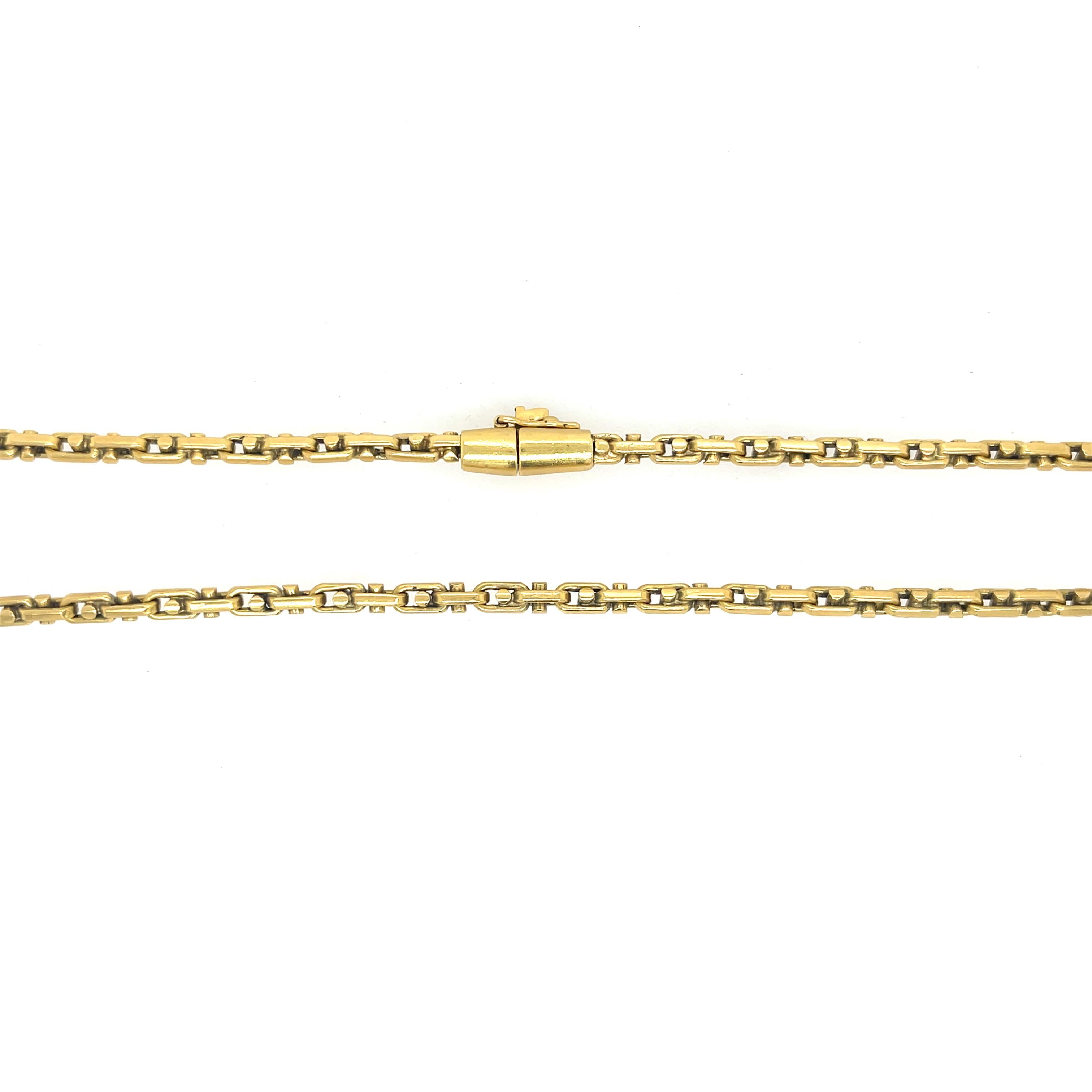 Fancy Link Chain in 18K Yellow Gold with a Barrel Style Clasp. 
27” Length
46.7 Grams
3mm wide