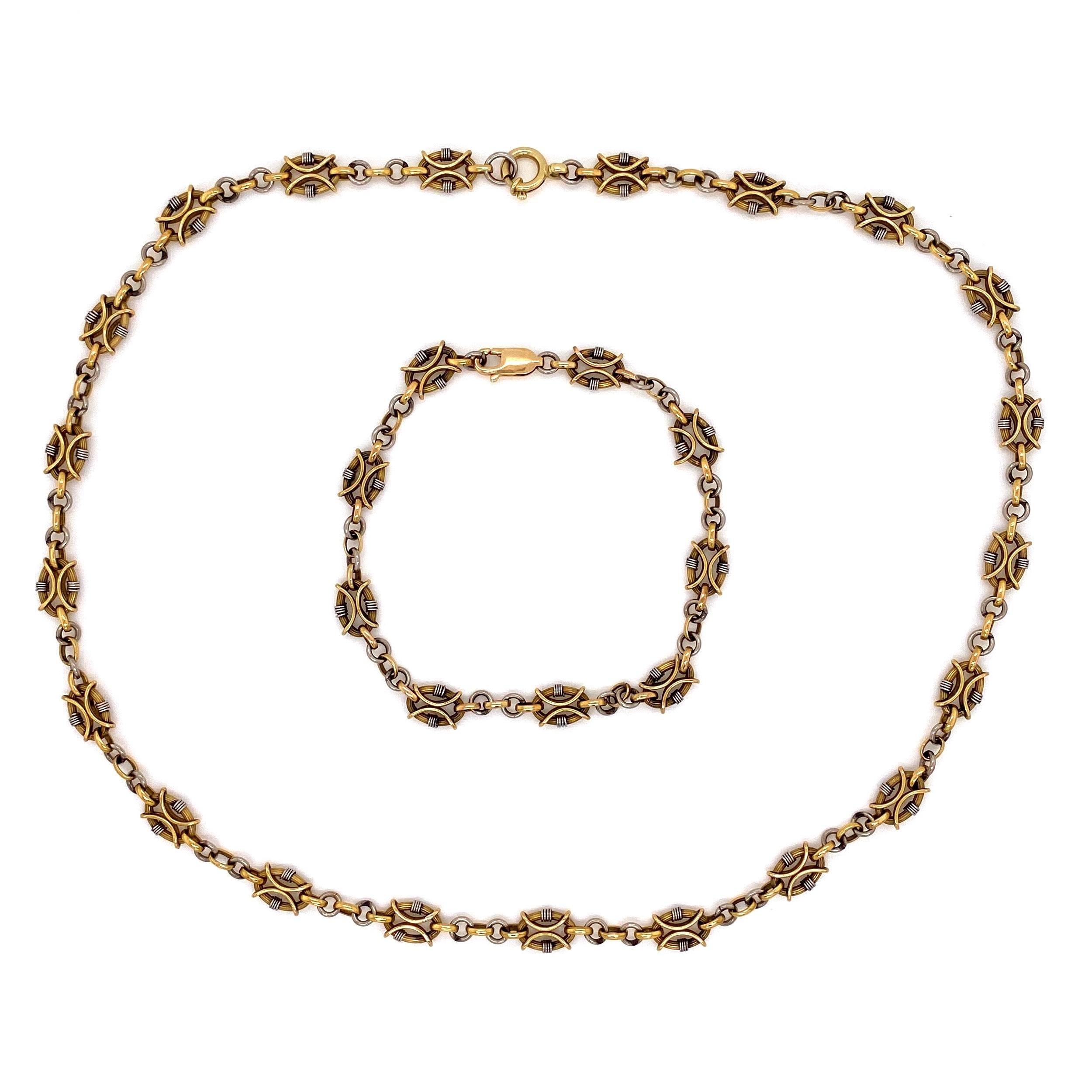 Classic and Stylish Necklace and Bracelet boosting Beautiful fancy chain link style designs. Handmade set is in Platinum and 18 Karat yellow Gold. Length of necklace: 23”; length of bracelet: 7”. This necklace and bracelet epitomize vintage charm