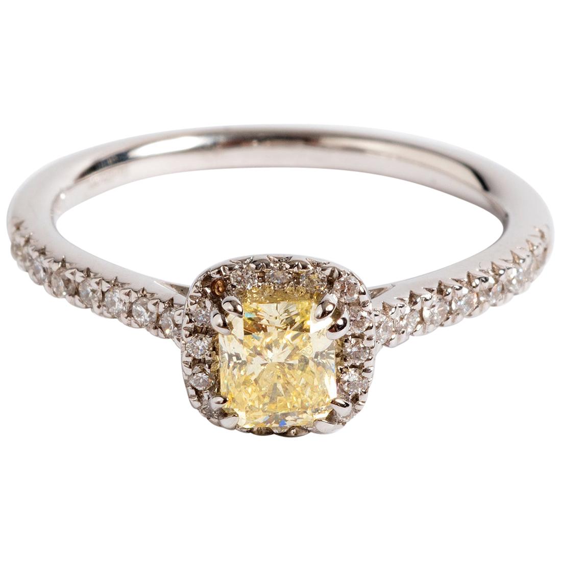 Pear Cut Fancy Yellow Diamond Ring with White Diamond Accents 18 Karat Gold Band For Sale at 1stDibs
