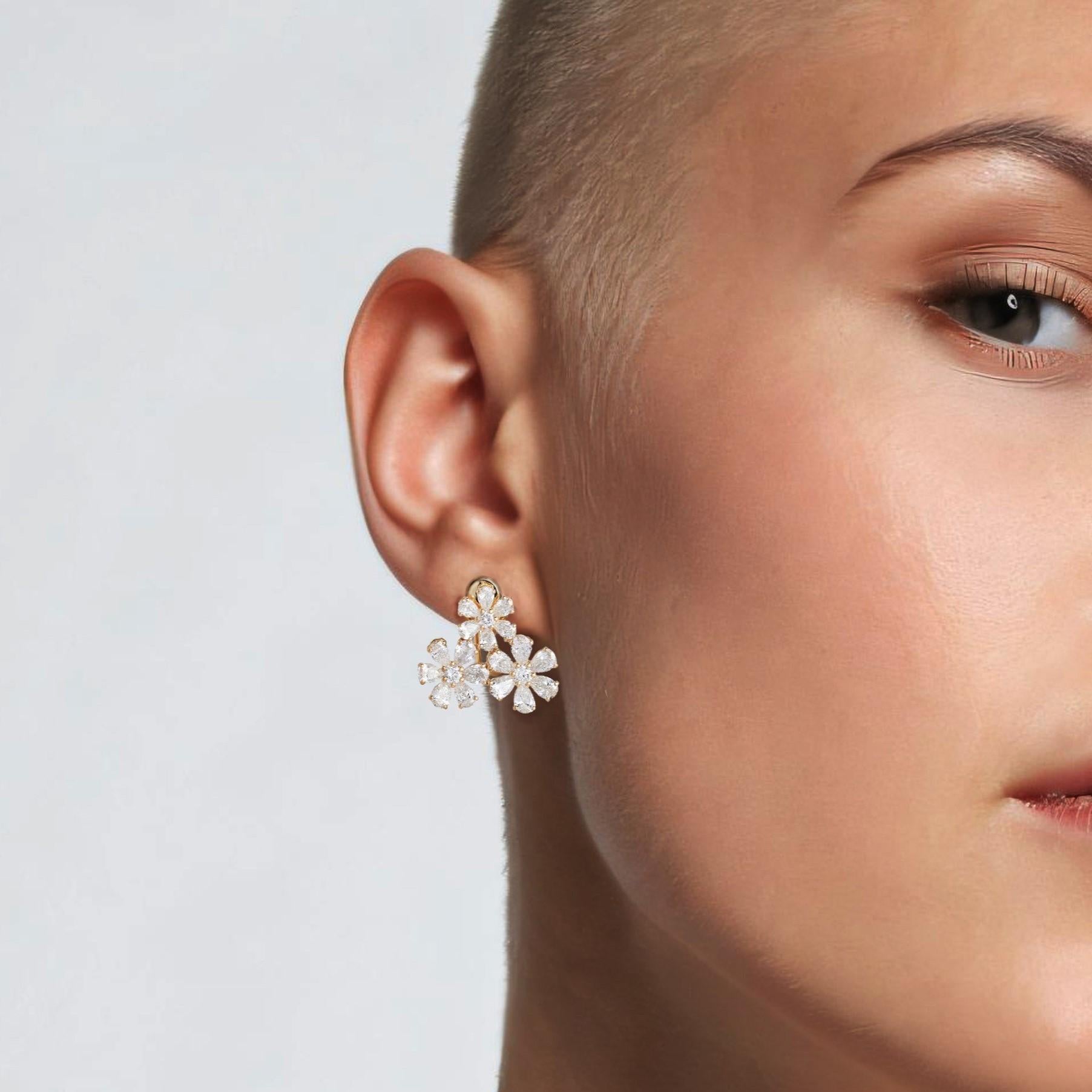 These Fancy Opulence 14K Yellow Gold Diamond Stud Earrings are crafted with 14K yellow gold and showcase a beautiful arrangement of fancy diamonds. With a diamond weight of FCD0.44CT and PR4.55CT of premium fancy diamonds, these earrings radiate