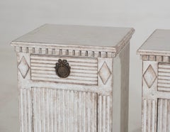 Fancy pair of bedside tables, 19th C.