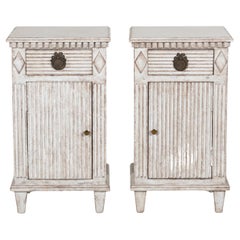 Fancy pair of bedside tables, 19th C.