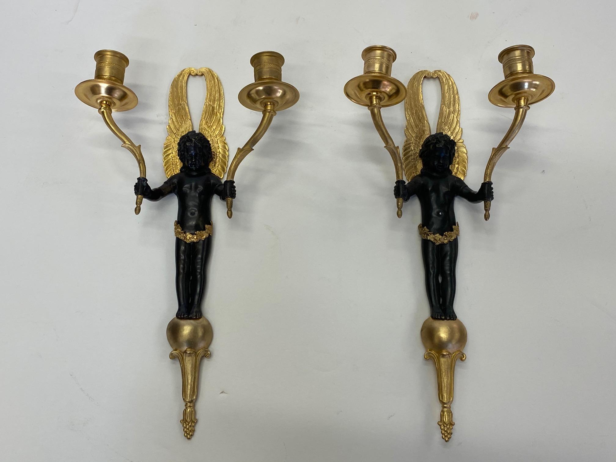 Fancy Pair of French Gilt and Patinated Bronze Wall Sconces with Putti In Good Condition In Hopewell, NJ