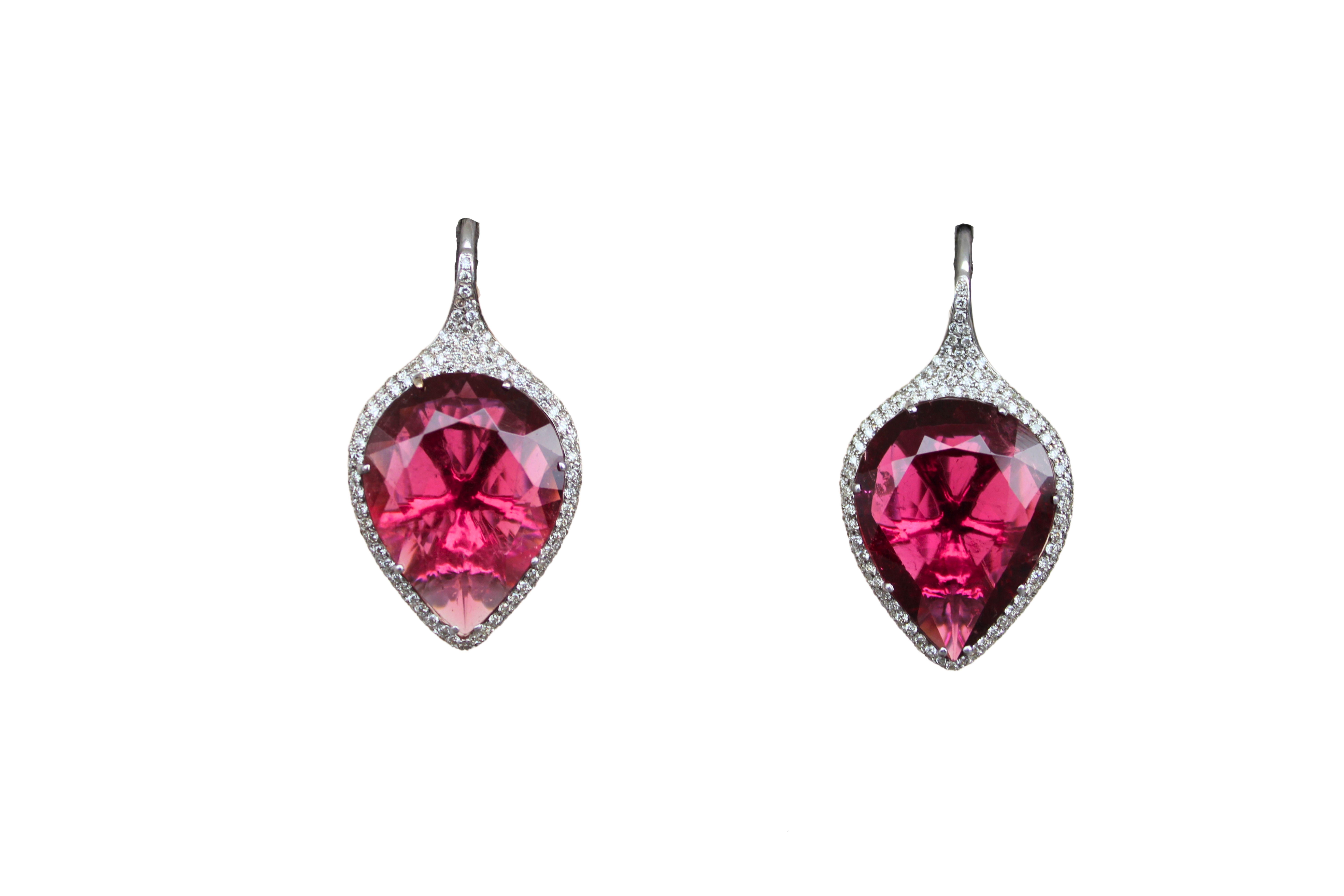 18K White Gold
20 CTW of Pink Red Rubellites 
Rubellites are in a beautifully symmetric and faceted Pear-Shape form and Brilliant-Cut faceting. 
Around 1 carats of G/VS Quality Grade Diamonds
Beautiful, Unique, Luxurious earrings
5 CM length from