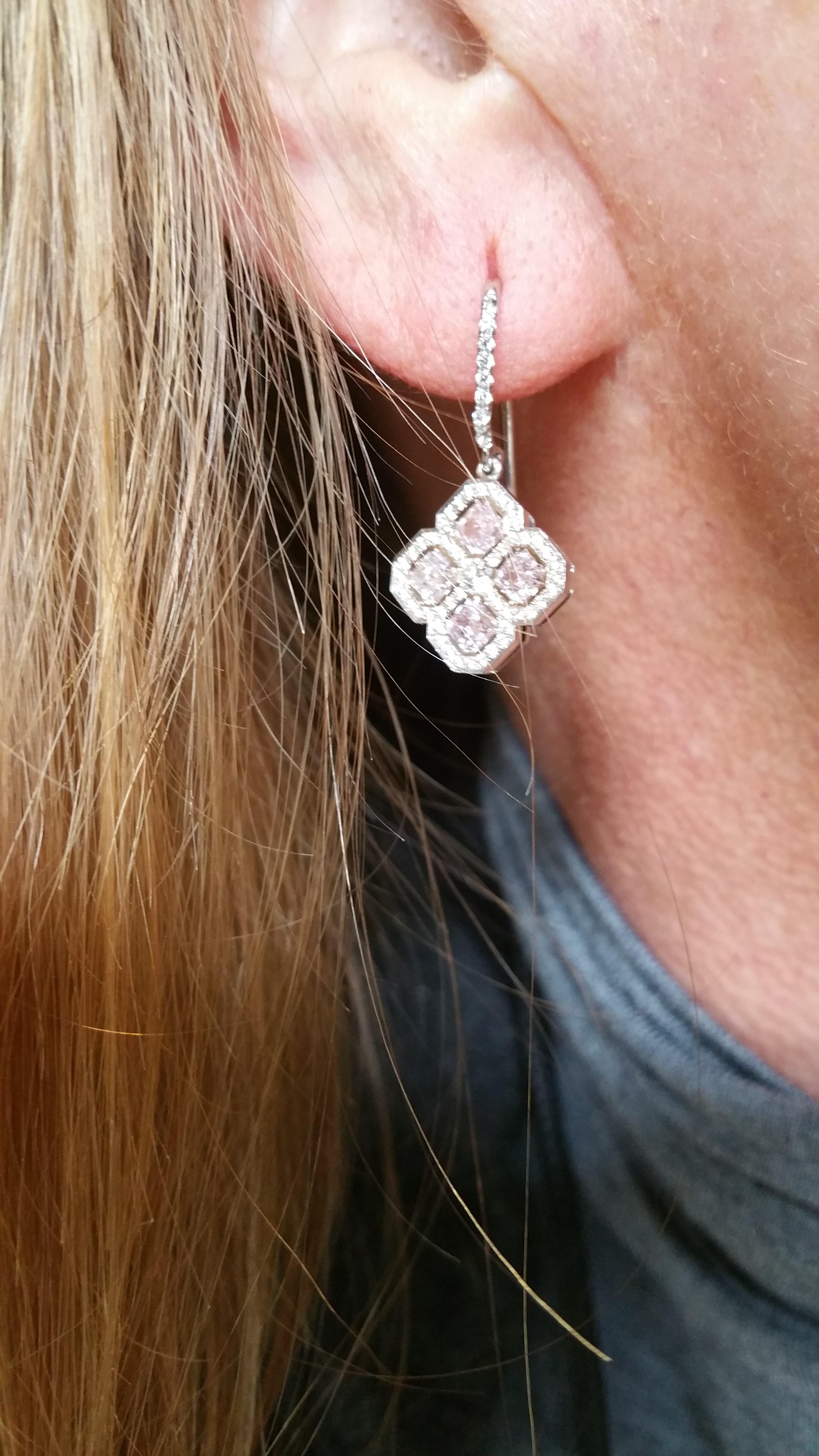 Delightfully refreshing style from Scarselli with these Natural Fancy Pink Diamond Drop Earrings. The eight sparkling pink radiant cut diamonds total 1.34 carats and the 1.14  small white round diamonds total  .58 carats all mounted in Platinum