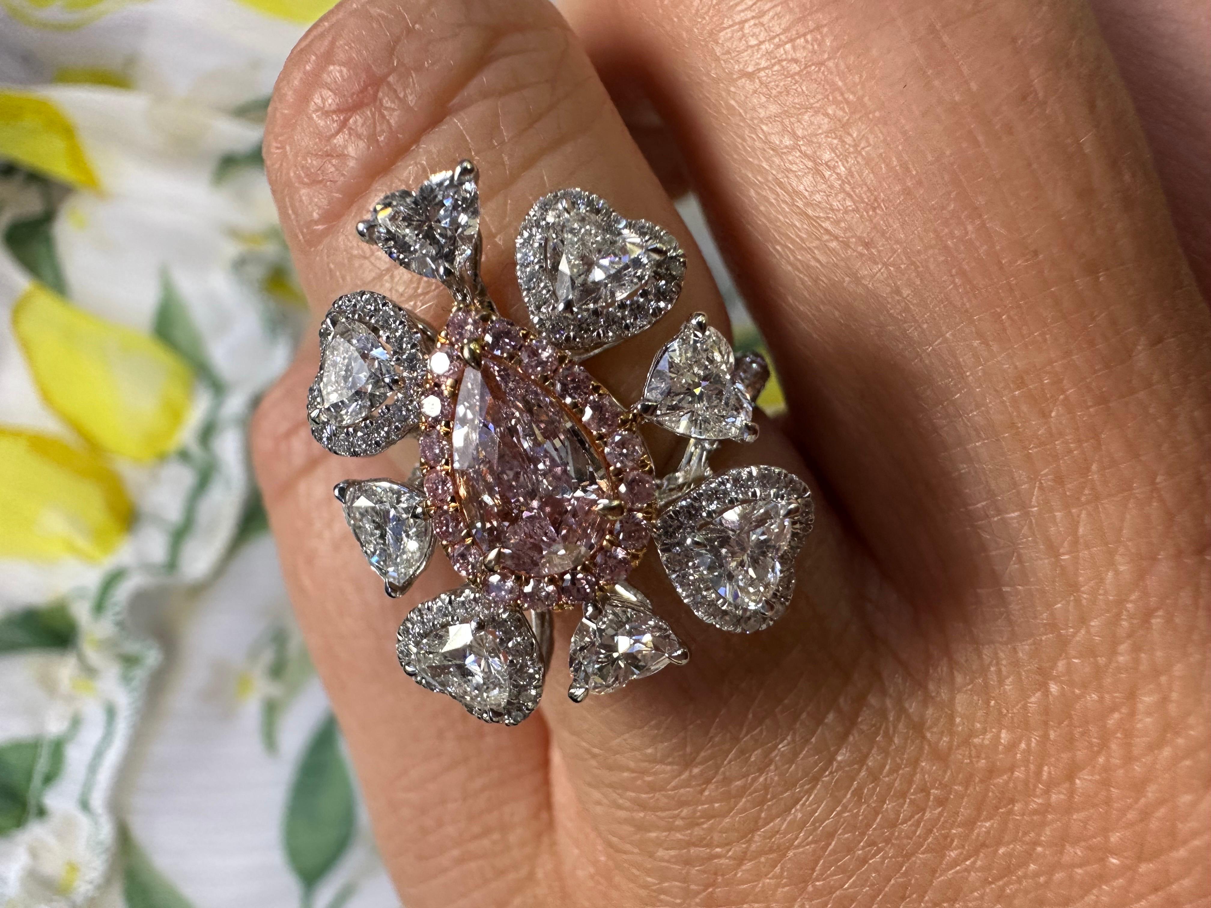 One of  a kind fancy pink diamond ring, a fun art deco style ring with pink and white diamonds in 18KT white gold, creator unknown but complexity of the ring speaks for itself, the designer definitly wanted a statement piece of jewelry and