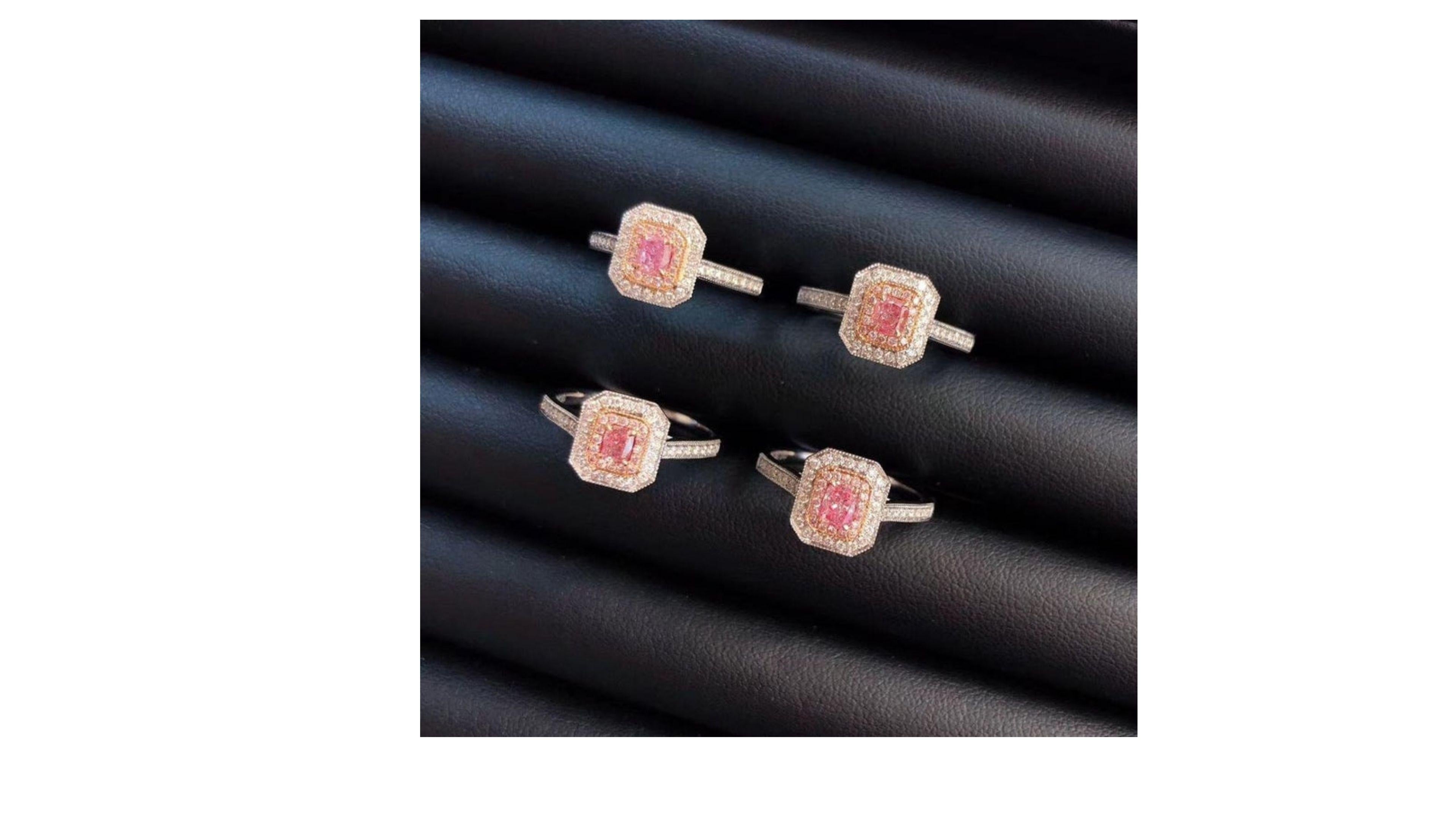 This is a unique  Fancy Pink Diamond with 41 white diamond around it including on each side of the band and in the centre its rose gold which does make it stand out too.  The Argyle mine which turns out a lot of them has closed so this makes these