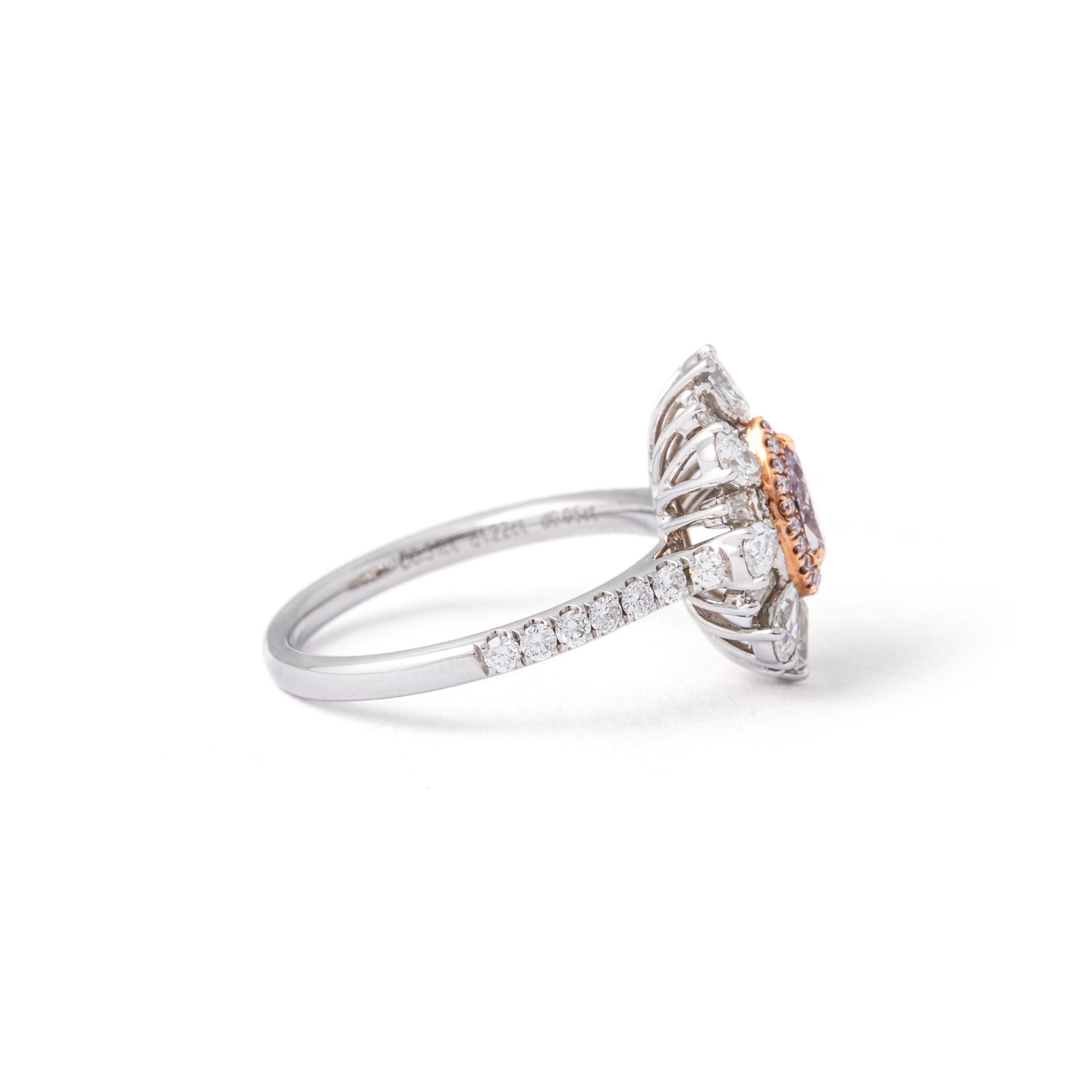 Fancy Pink Purple Diamond White Gold 18K Ring.

GIA certificate:
GIA, 0.31 carats fancy pink-purple, I1, natural.

Ring Size: 52.5 / 6.25 US.
Total weight: 4.05 grams.