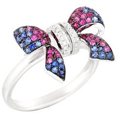 Anello in oro bianco con diamante bianco e zaffiro blu e zaffiro rosa Fancy Diamond