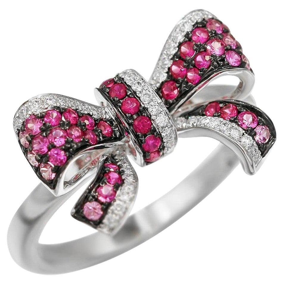 For Sale:  Fancy Pink Sapphire White Diamond White Gold Bow Tie Statement Ring