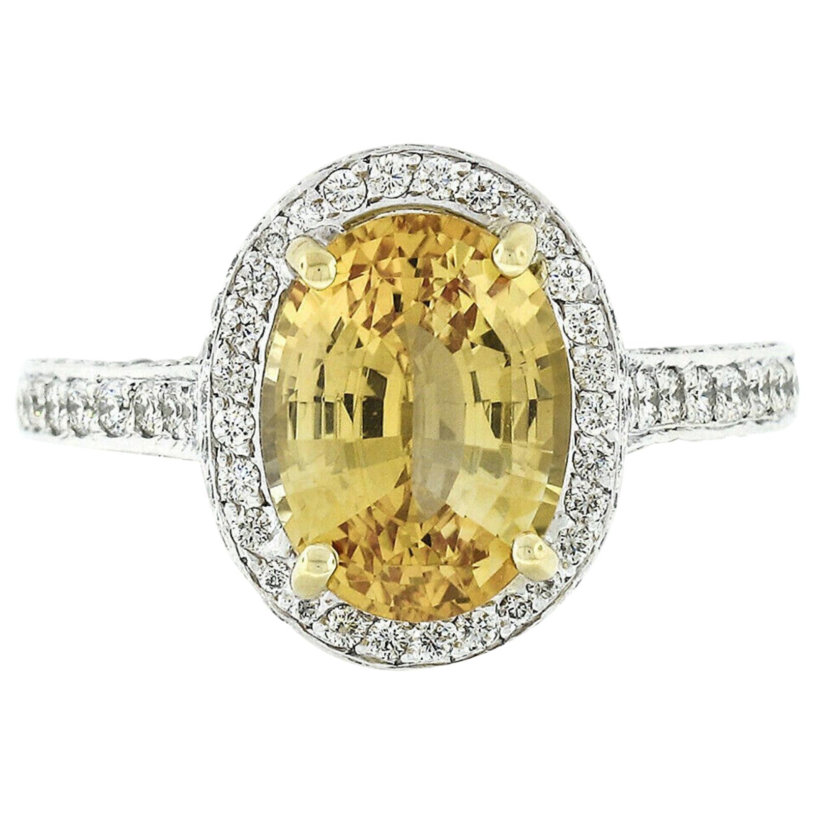 Fancy Platinum 5.6 Carat GIA Oval Yellow Sapphire and Diamond Cocktail Ring