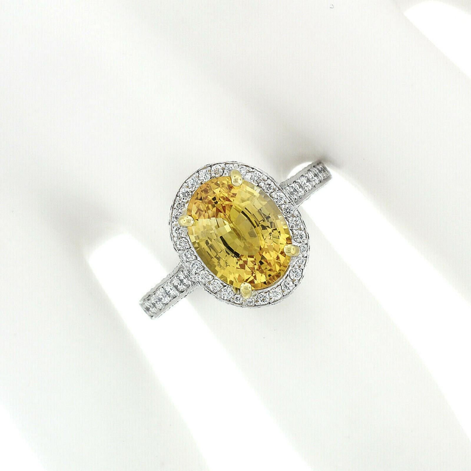 Oval Cut Fancy Platinum 5.6 Carat GIA Oval Yellow Sapphire and Diamond Cocktail Ring