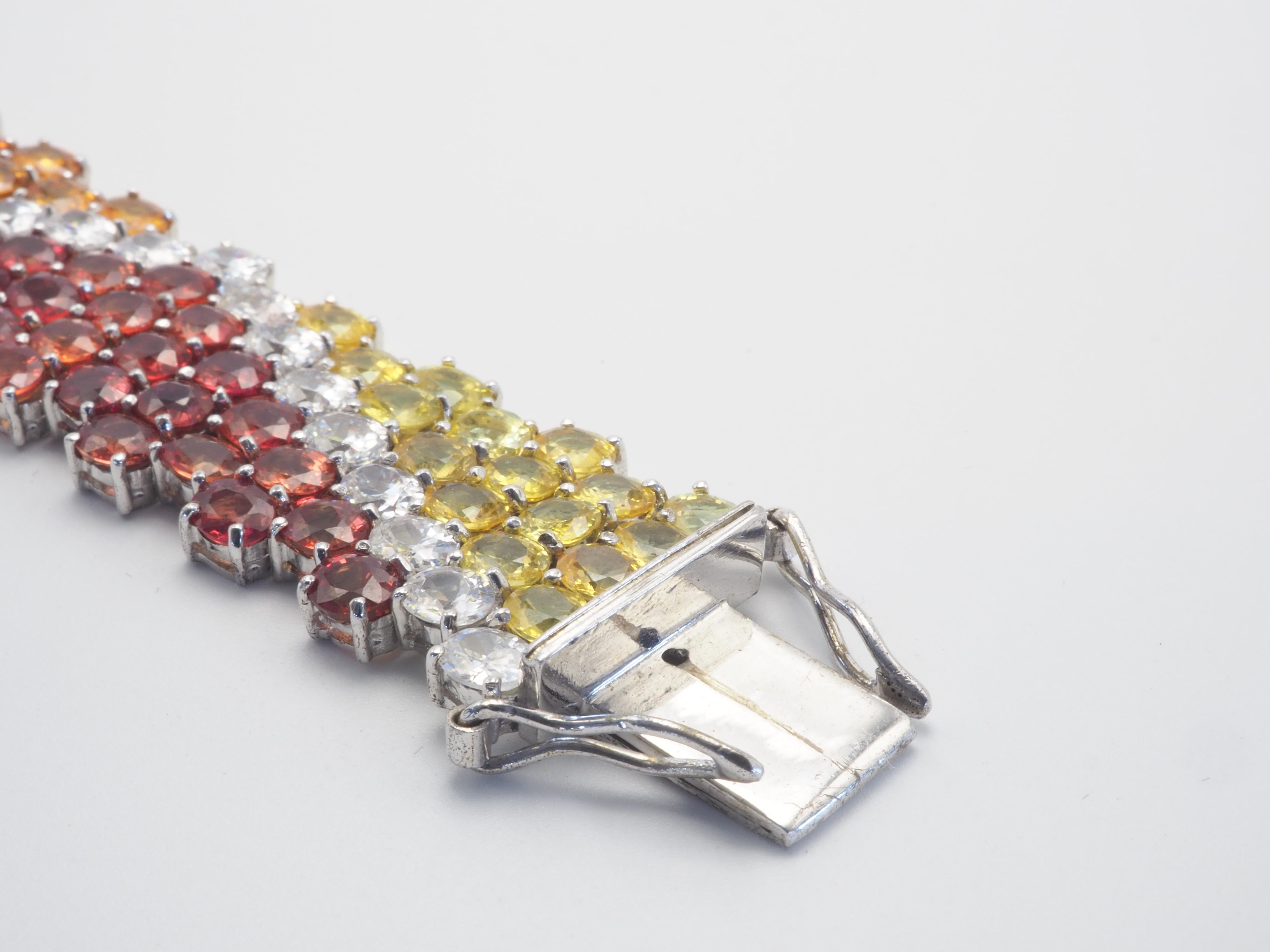 Fancy Rainbow Regal 76.90ct Fancy Sapphires & Quartz Sterling Silver Bracelet In Excellent Condition For Sale In เกาะสมุย, TH
