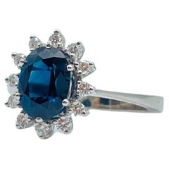 Fancy ring in lady diana still with diamonds and sapphire