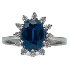 Fancy ring in lady diana still with diamonds and sapphire