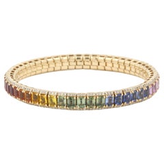 Elastisches Armband aus 14 Karat Gelbgold mit Saphiren und Diamanten