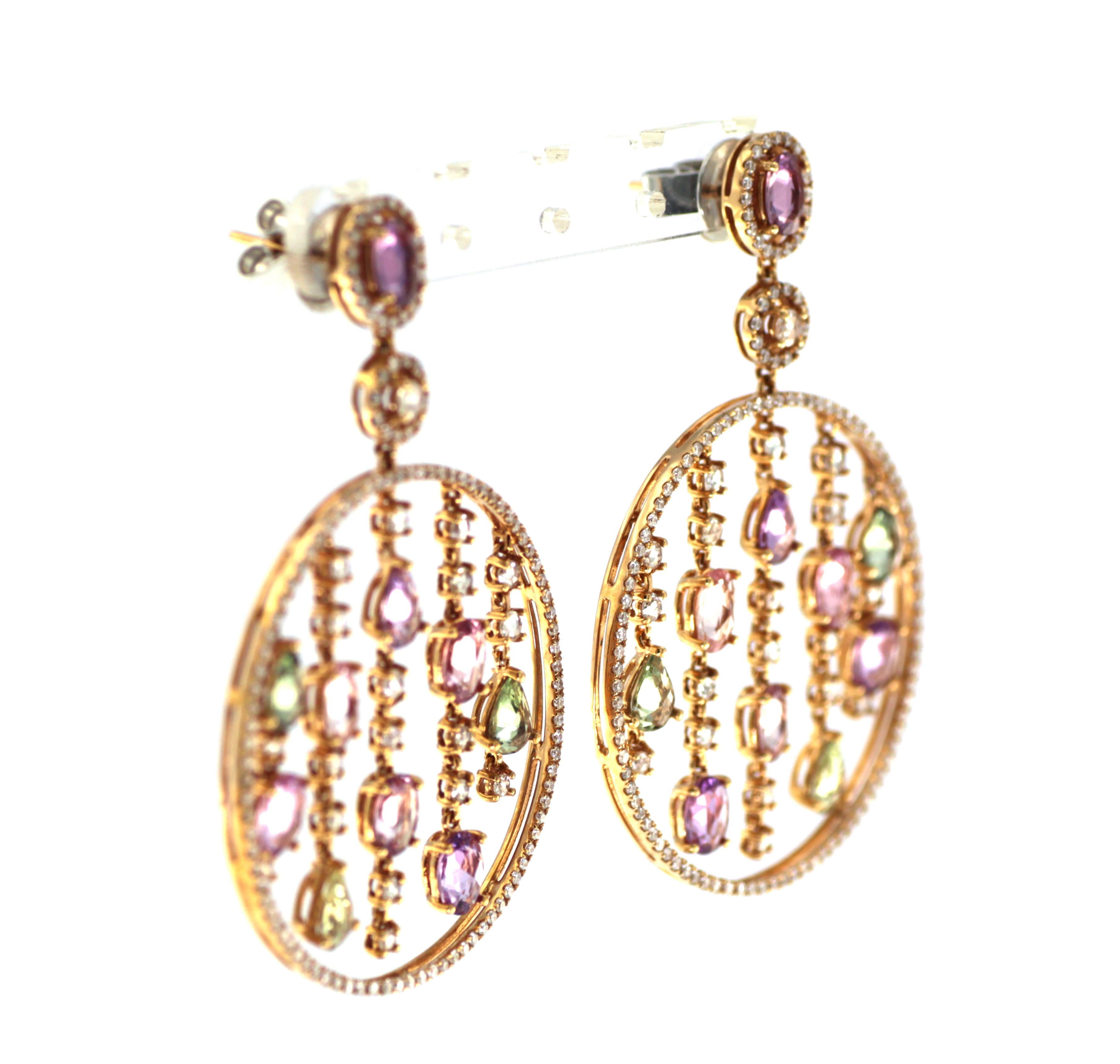 This earrings feature 9.50carats of rose cut fancy sapphire, assented with 1.38 carats of white round diamonds and 0.86carats rose cut diamonds. Earrings are set in 18 karat rose gold. 
18 Karat Rose Gold
Fancy Color Sapphire 9.50 carat
Rose Cut
