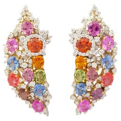 Pendientes de zafiro fantasía con diamantes engastados en oro de 18 quilates