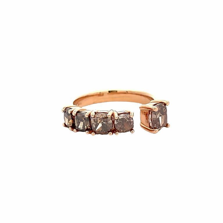 We are proud to present our gorgeous 2.42-carat Chocolate Diamond Fashion Ring, meticulously crafted to leave a lasting impression. Made with the finest 18-karat rose gold, this stunning piece features a stunning arrangement of fancy-shaped cushion