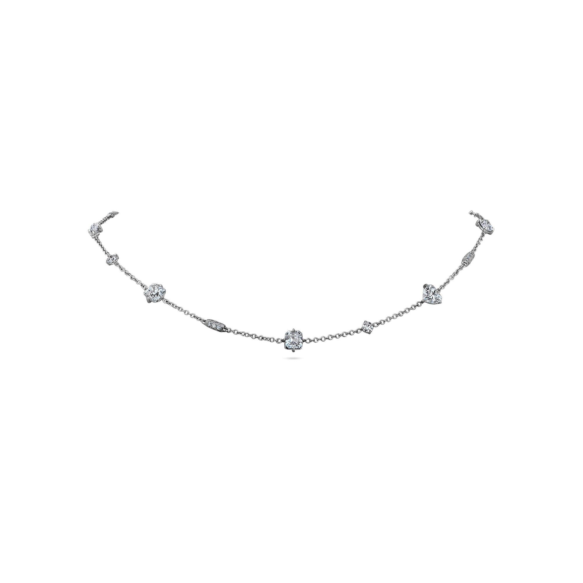 A rare collection of fancy shape diamonds dance gracefully together creating a one-of-a-kind necklace that is a musical masterpiece. Designed and handmade by Steven Fox, this platinum necklace features one heart shape diamond and a symphony of